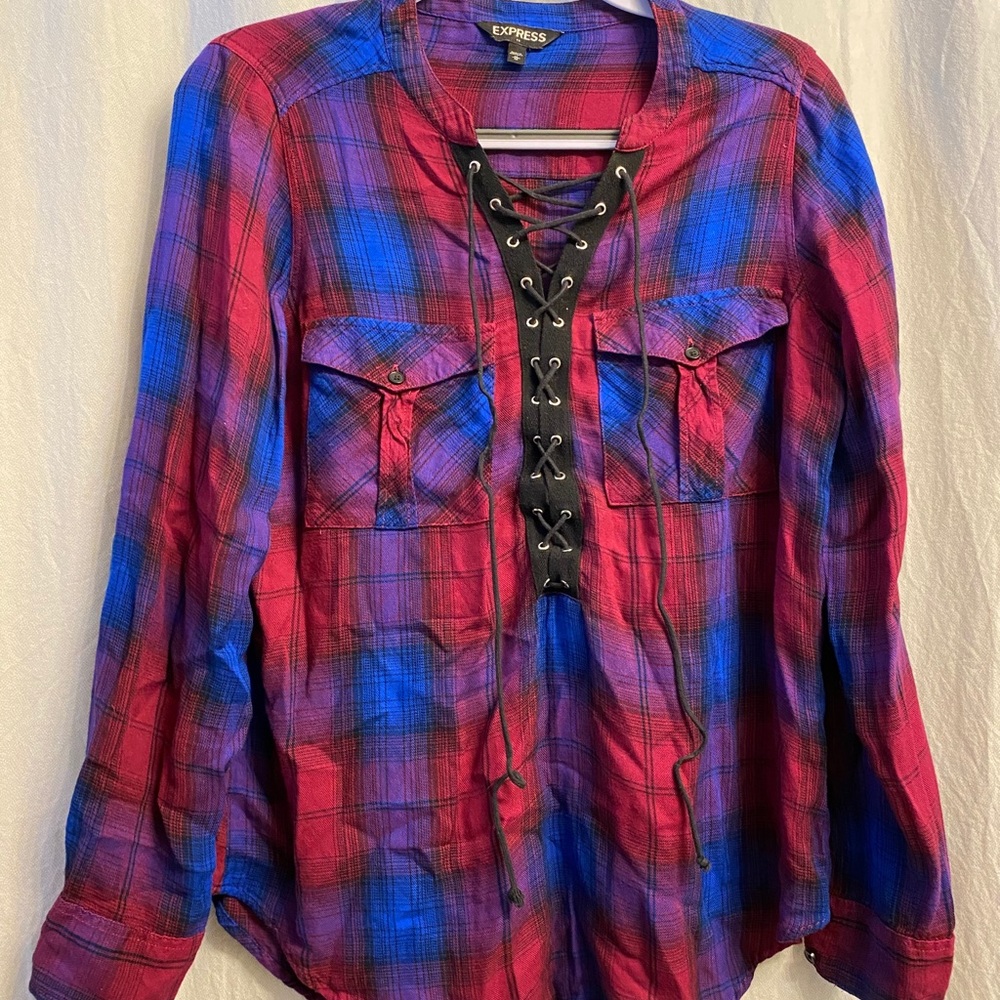 Multi colored lace up plaid long sleeve shirt.